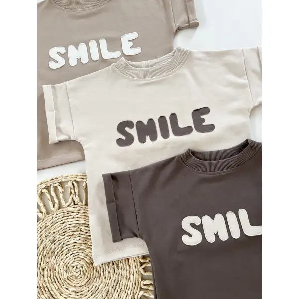 T-SHIRT BAWEŁNIANY ,, SMILE ’’