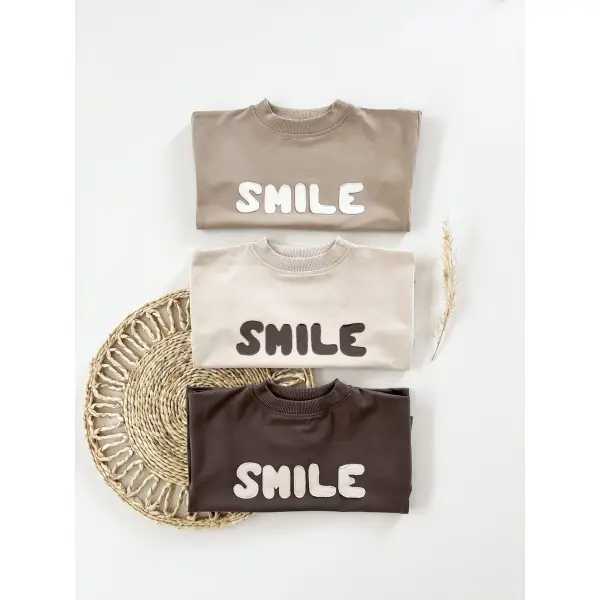 T-SHIRT BAWEŁNIANY ,, SMILE ’’